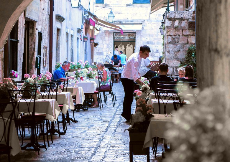 Restaurant tables on street in Dubrovnik