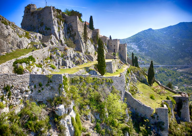 Kliss Fortress in Split with blue sky and mountain scenery