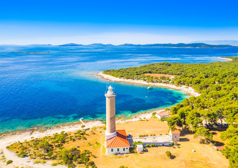 View of lighthouse on Dugi Otok with turquoise water