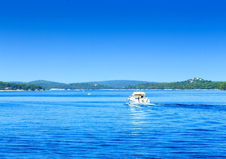 Blue water of Mali Losinj with speedboat