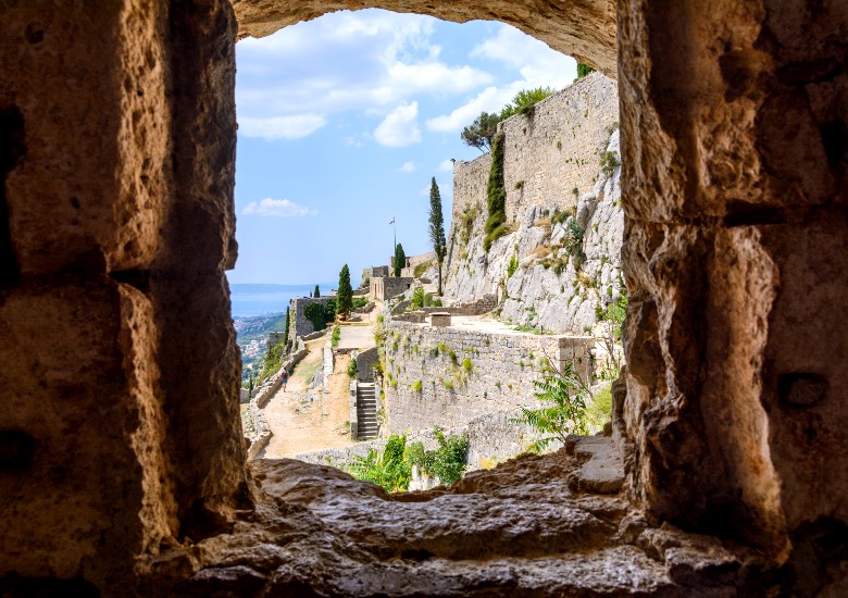 Walls of Klis Fortress and view looking over the fortress